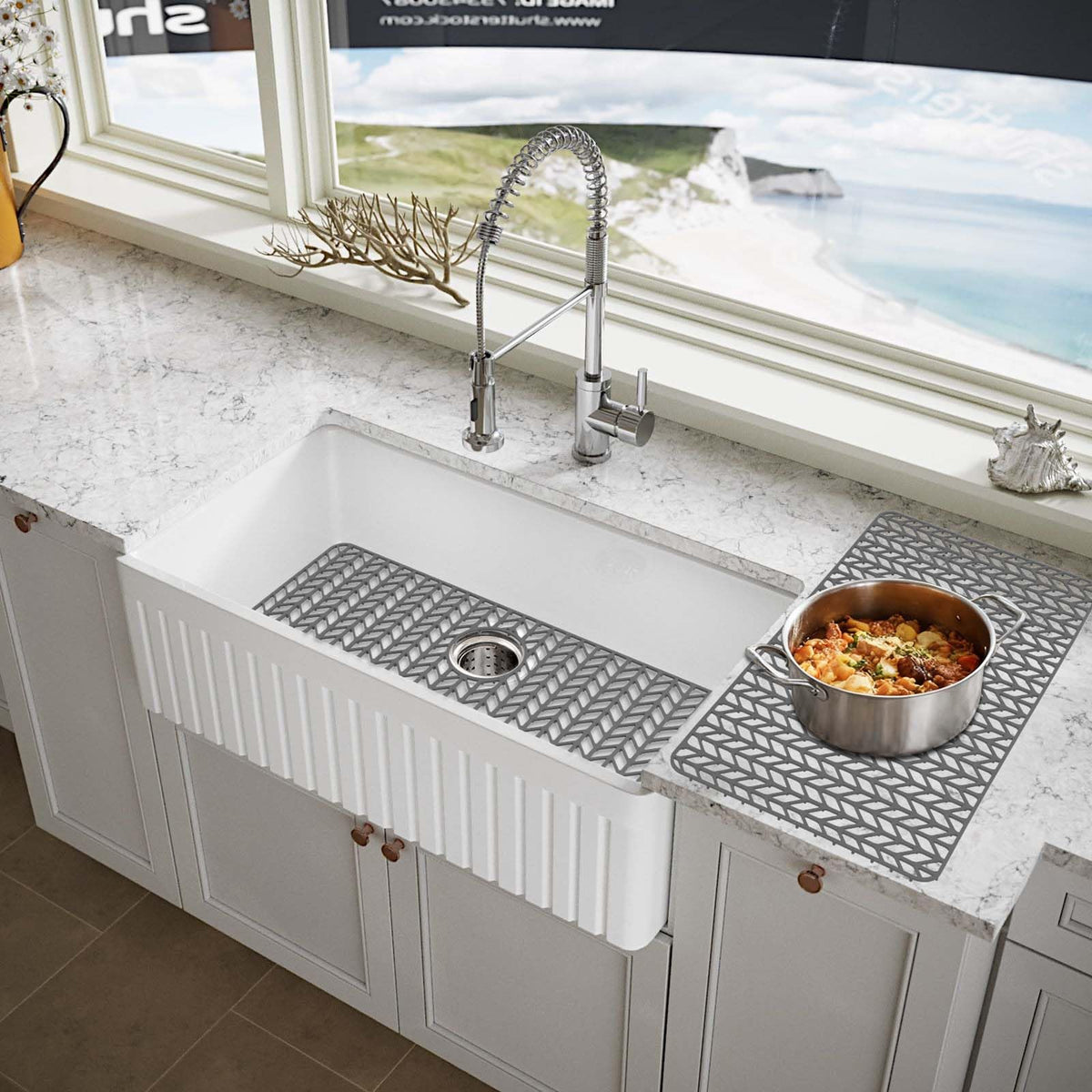 AWOKE gray silicone sink protector blends into kitchen with farmhouse style.