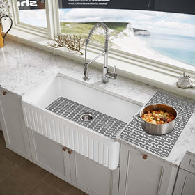 AWOKE gray silicone sink protector blends into kitchen with farmhouse style.