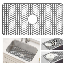 AWOKE large silicone sink protector with center drain hole protects large sinks while promoting fast drainage.