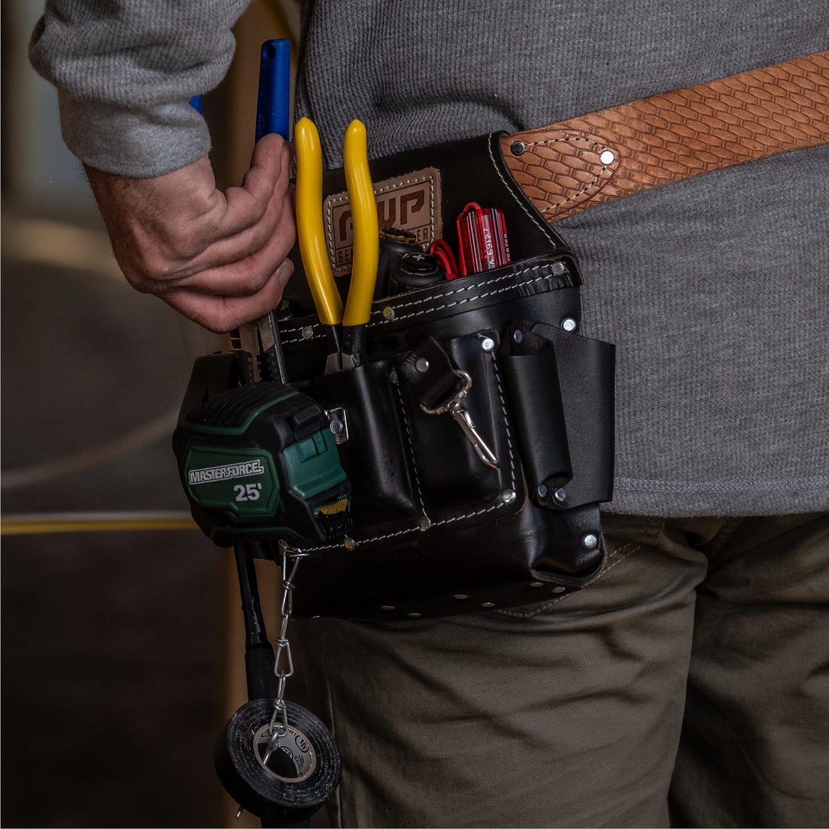 AWP Premium Tool Pouch carabiner attachment enables quick tool clipping.