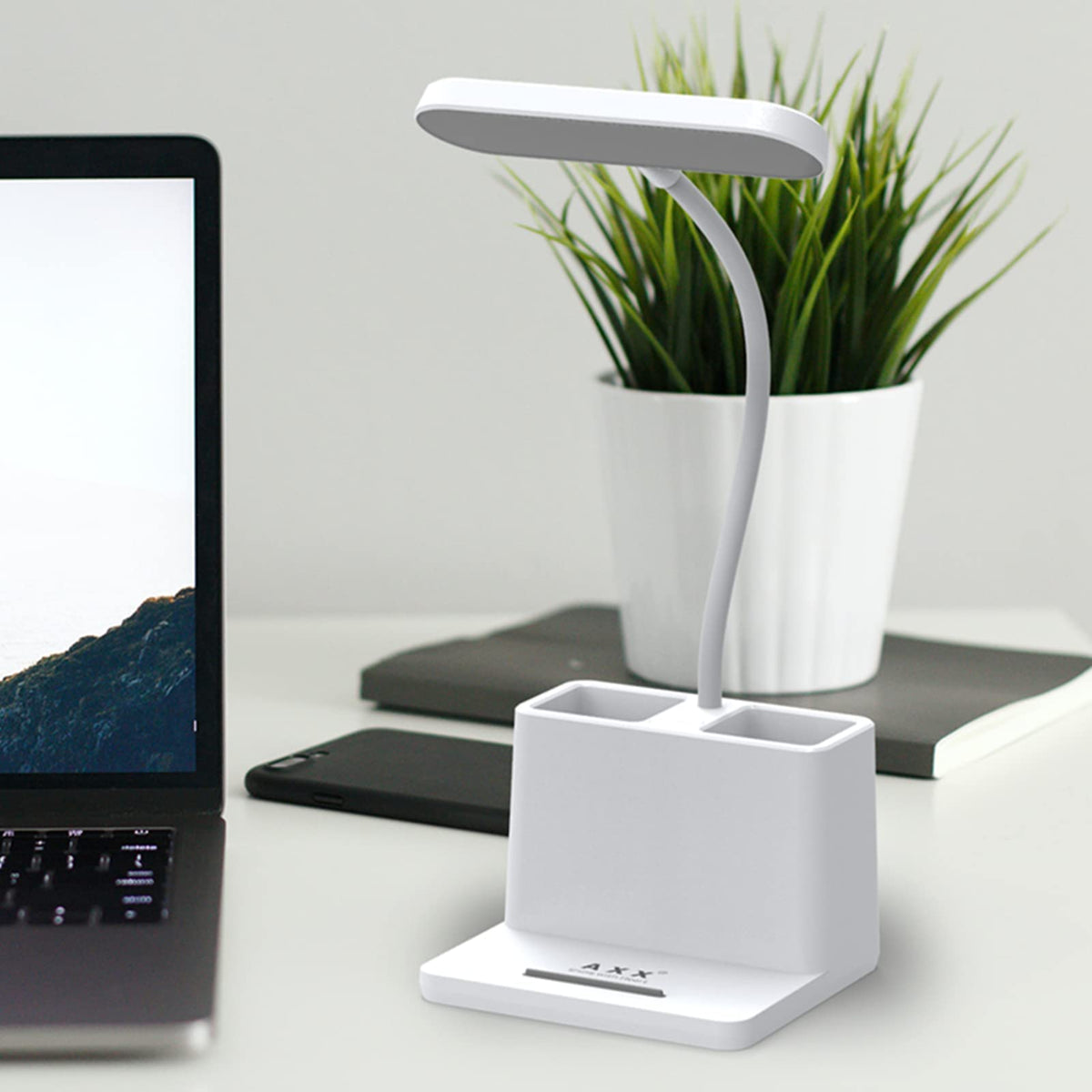 AXX desk lamp with pen holder keeps writing tools within reach