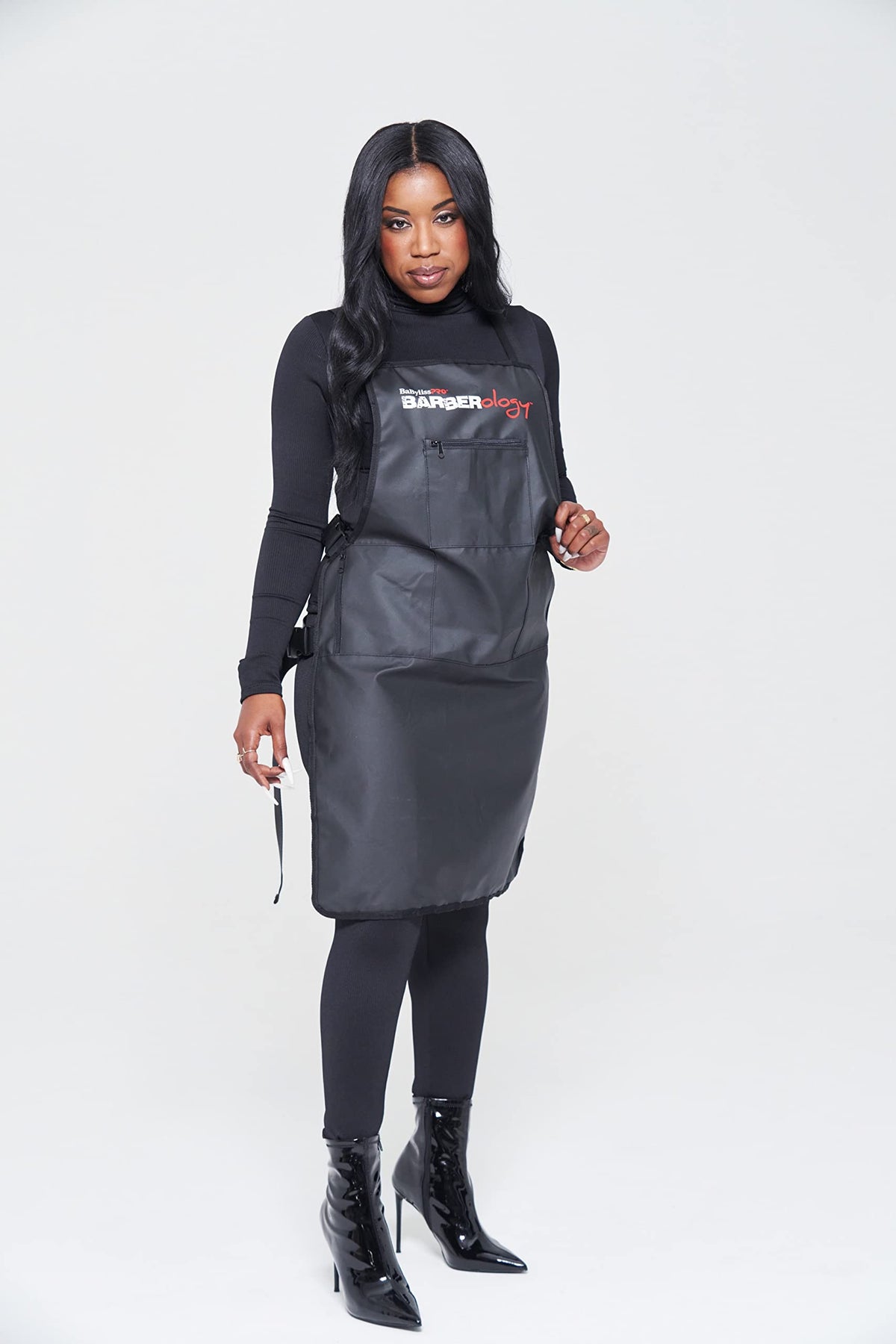 BaBylissPRO Barberology Apron full-length black design helps keep clothes clean.