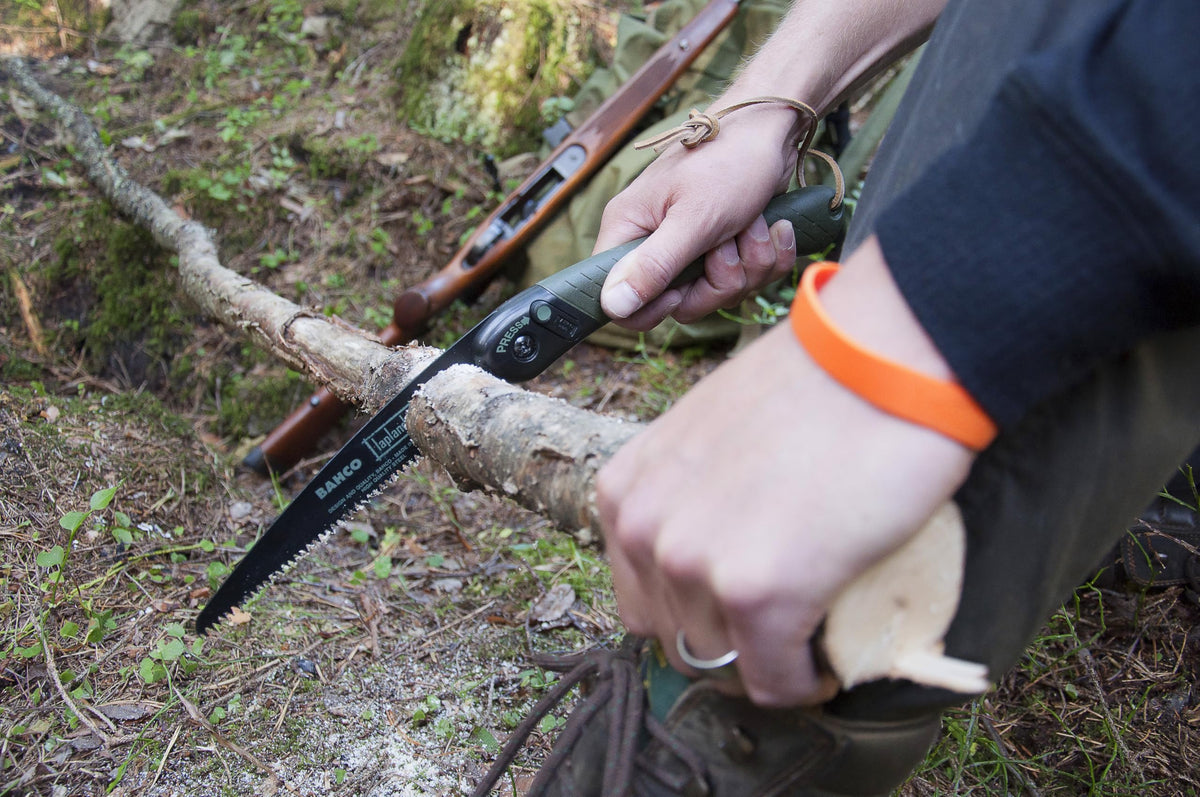 Bahco Laplander backpack-ready storage for mobile trail work.