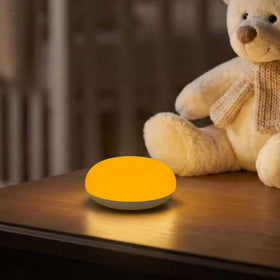 Bakzon compact bedside light fits small nursery spaces