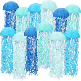 Baquler jellyfish lanterns in blue glow create a magical sea-themed centerpiece.