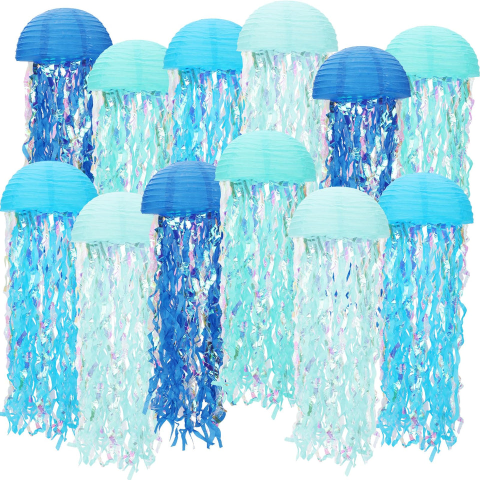Baquler jellyfish lanterns in blue glow create a magical sea-themed centerpiece.