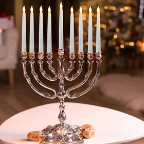 Baquler white flameless candles blend with holders for elegant Christmas decor.