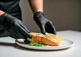 Large size Basic Synmax black vinyl gloves for a comfortable fit.