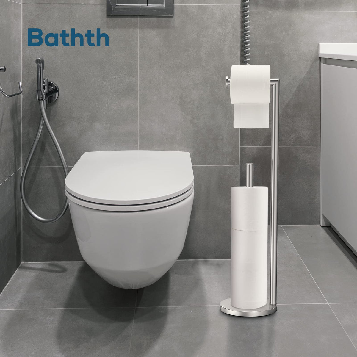 Bathth brushed-nickel toilet paper holder adds a modern touch.