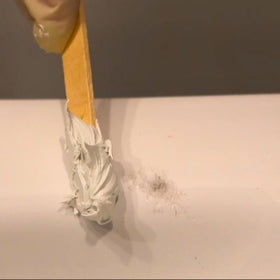Bathworks bonding agent and color-matching paint for a near-invisible repair.
