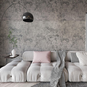 BAYYA cement grey wallpaper with concrete texture adds rugged style to a feature wall.