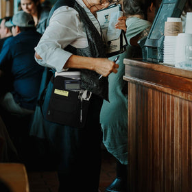 Beautyflier waist bag back pocket keeps receipts securely while serving.