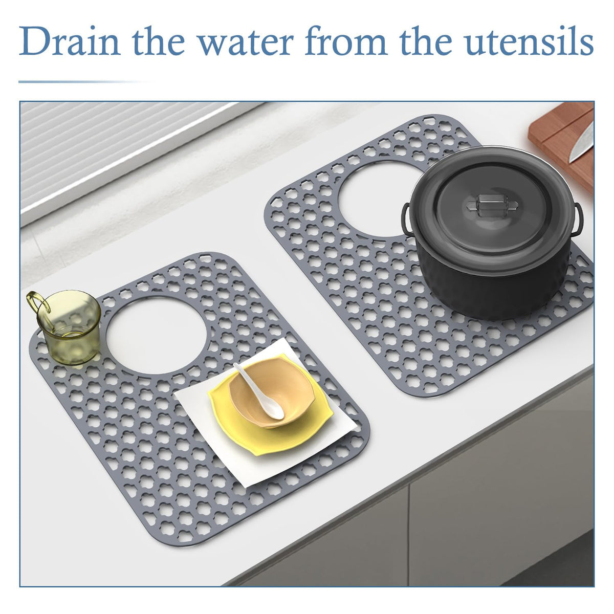 BEHOK silicone sink mat gray rolled for compact storage and quick setup.