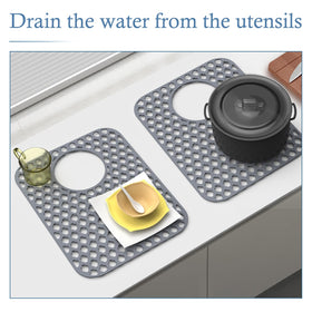 BEHOK silicone sink mat gray rolled for compact storage and quick setup.
