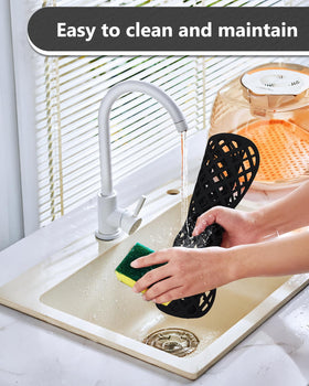 BEHOK silicone sink mat doubles as a drying rack for dishes.