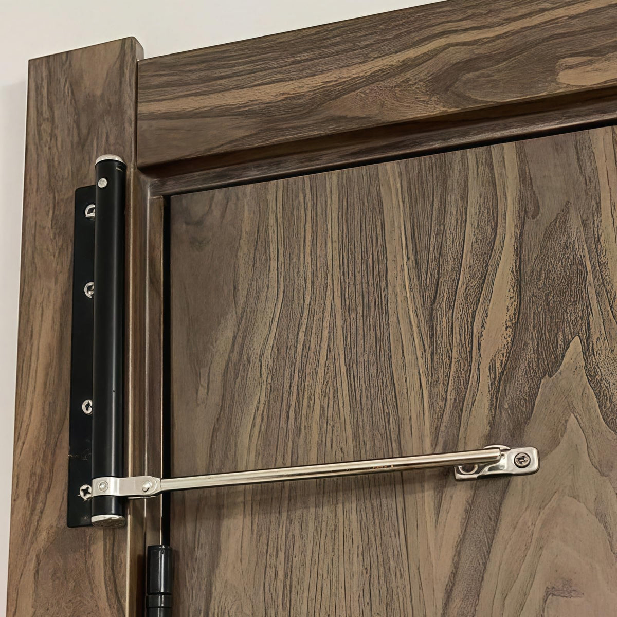Bellairis automatic door closer enabling 150-degree opening for easy passage.