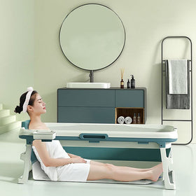 BELOAFIE foldable bathtub bottom-massage rollers soothe feet during a relaxing soak.