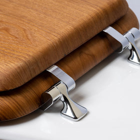 Bemis Mayfair chrome hinges seat adds modern shine and reliable operation.