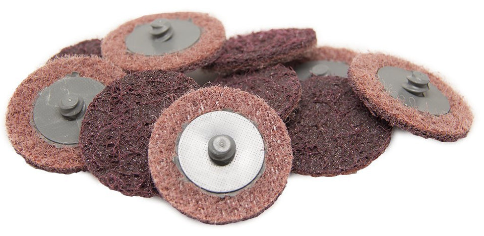 Benchmark Abrasives 2-inch quick-change sanding disc for deburring and finishing metal surfaces.
