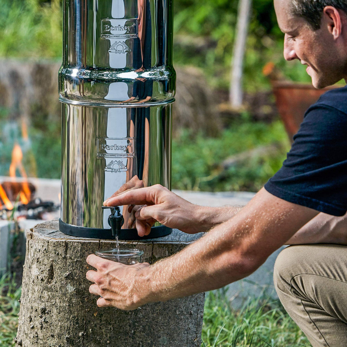 Berkey water dispensing action showing gravity-fed flow.