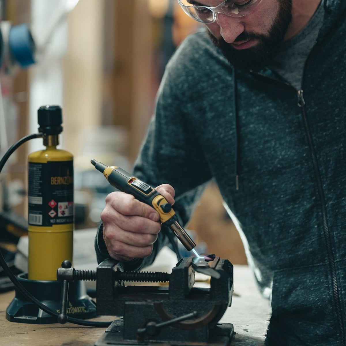 Bernzomatic FirePoint Creator Tool on lightweight fuel stand with dock for safe storage.