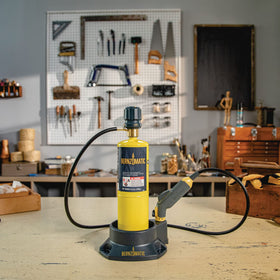 Bernzomatic FirePoint Creator Tool in a workshop highlighting flexible materials like wood and leather.