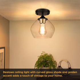 BesLowe industrial black accent fixture showcasing clear curved glass for vintage charm