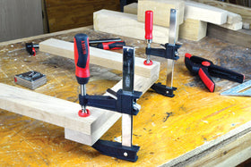 Powder-coated jaws resist wear on BESSEY clamp set for long-lasting use