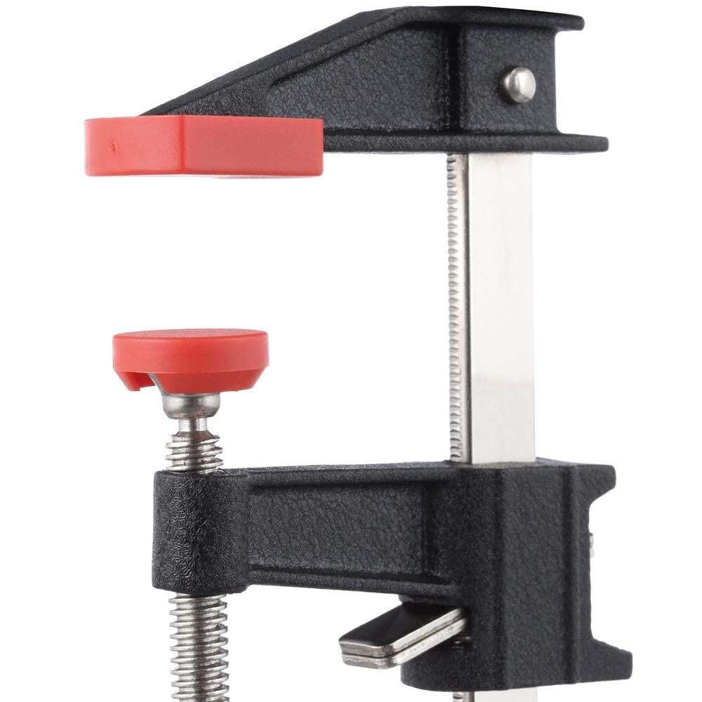 Serrated rail and cast iron jaws secure components for precise assembly with BESSEY clamps