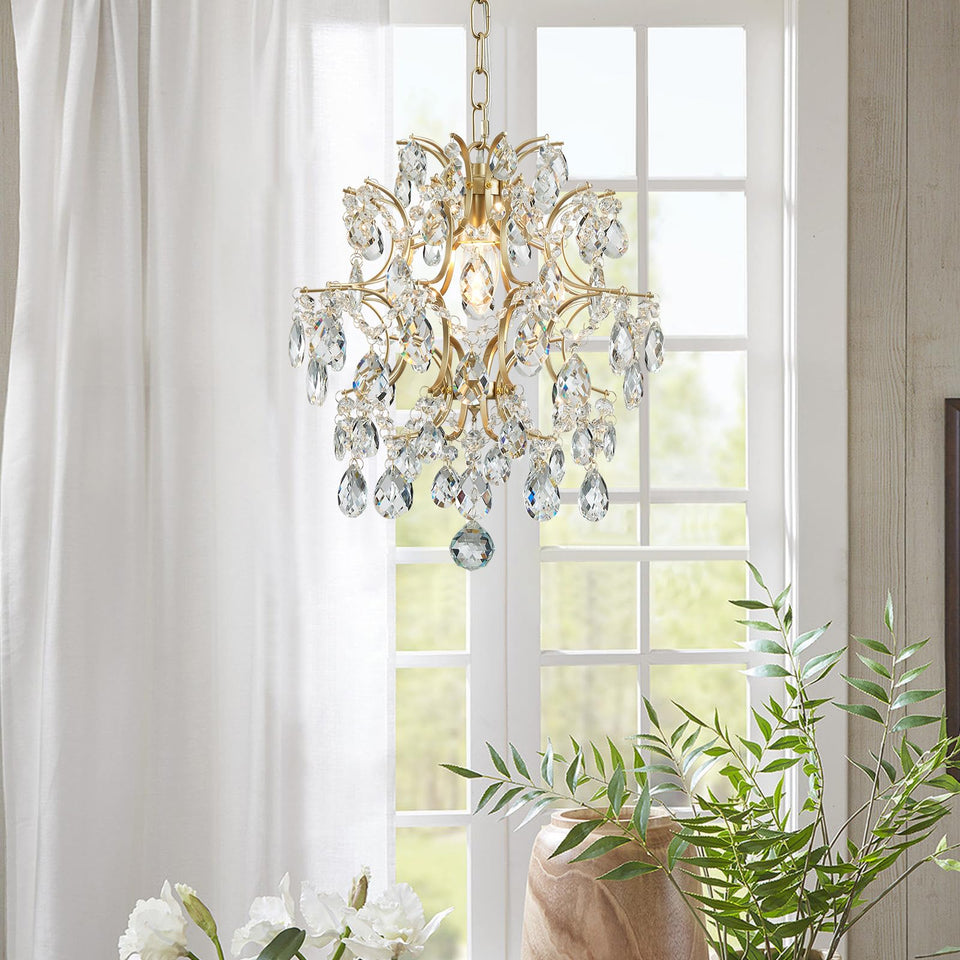 Bestier Gold Modern Pendant Crystal Raindrop Light over dining table, sparkling facets.