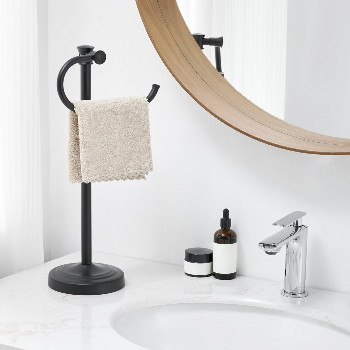 Besy matte black towel bar base shown for stability and style.