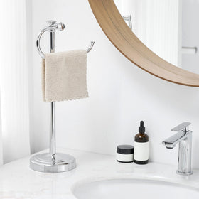 BESy free-standing polished chrome towel bar on a vanity surface