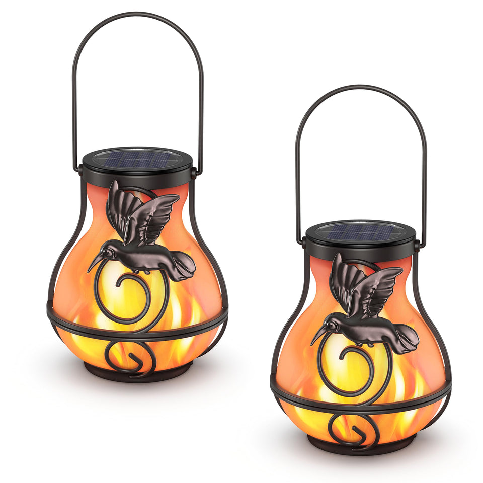 Betolean solar lantern with hummingbird dancing flame enhances garden ambiance.