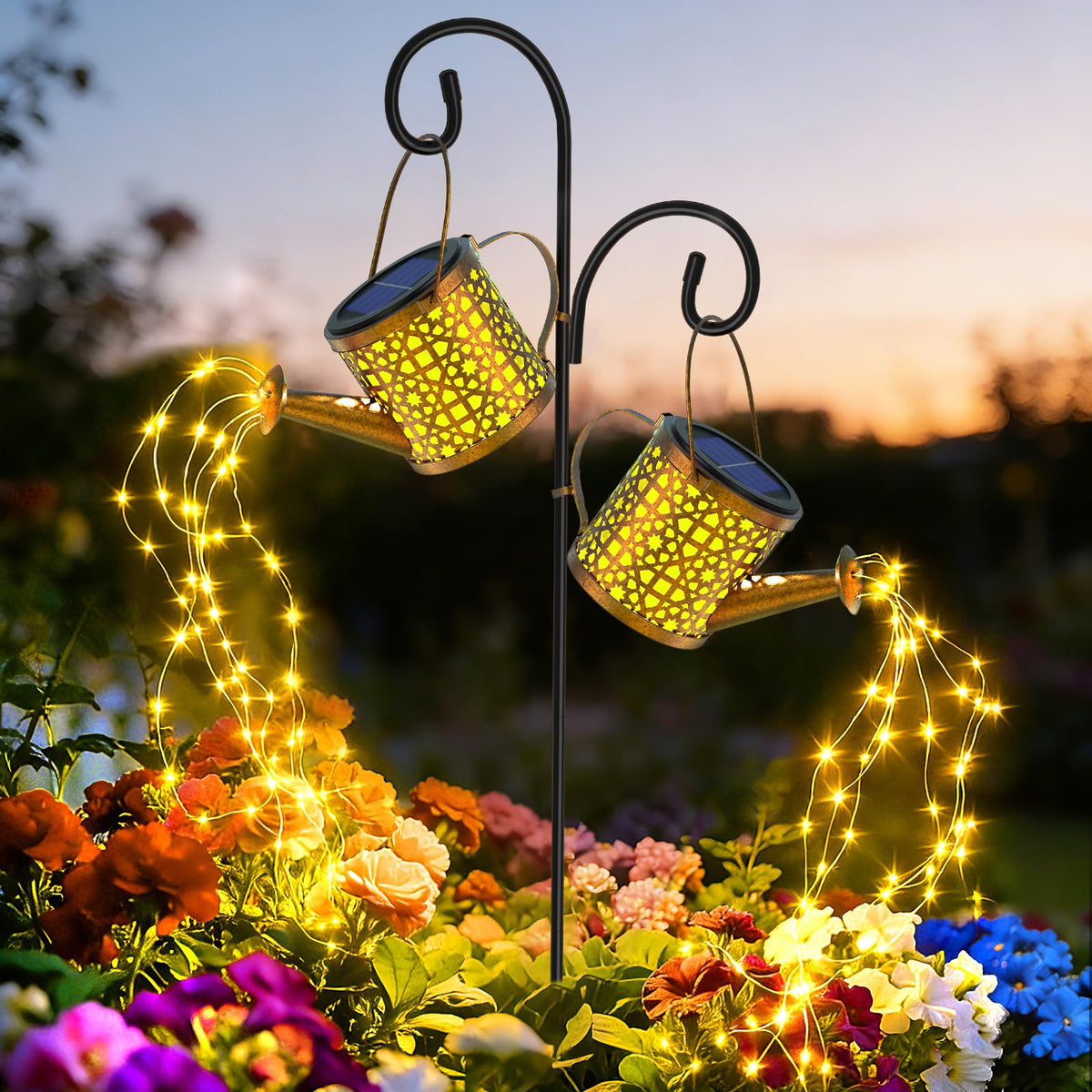 BETOLEAN solar watering can light outdoor with flowing star glow along the garden path.