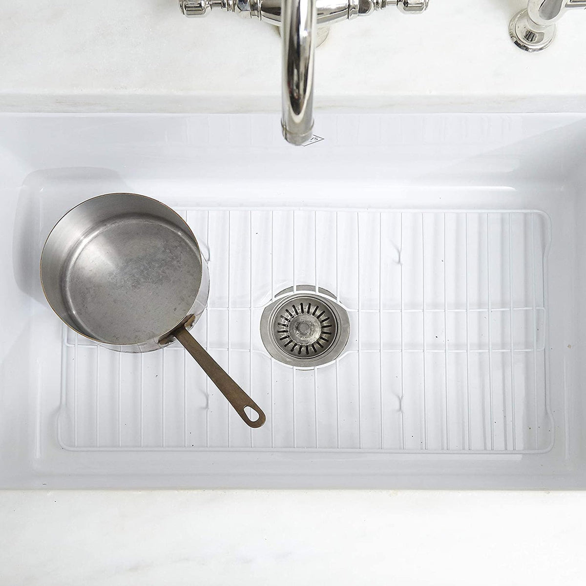 Better Houseware sink grid fits small sinks and prevents crowding in the basin.