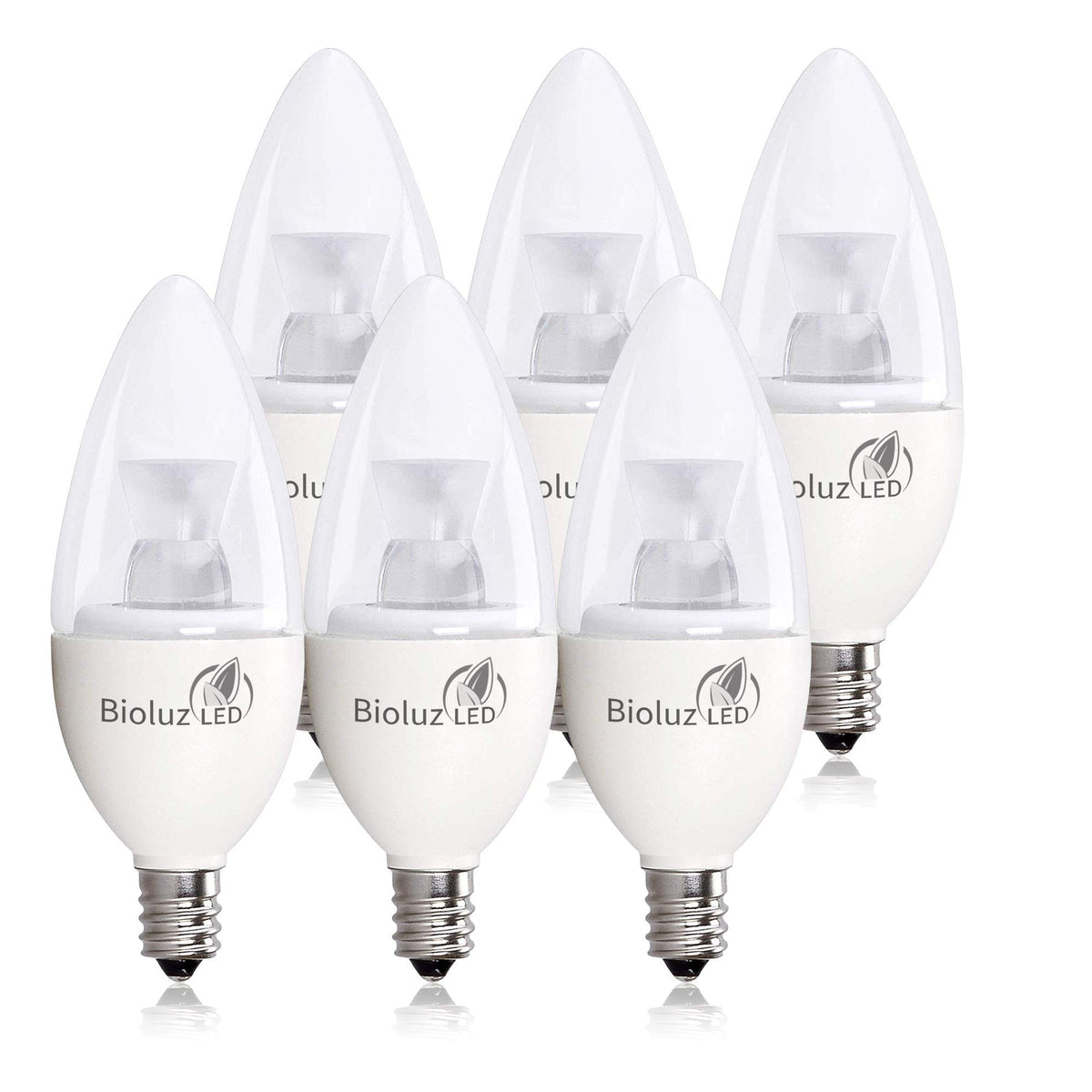 Bioluz LED candle bulb in chandelier delivers warm 3000K light.