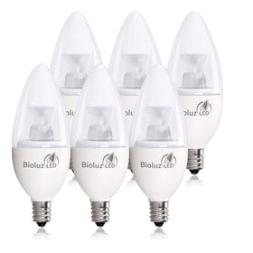 Bioluz LED candle bulb in chandelier delivers warm 3000K light.