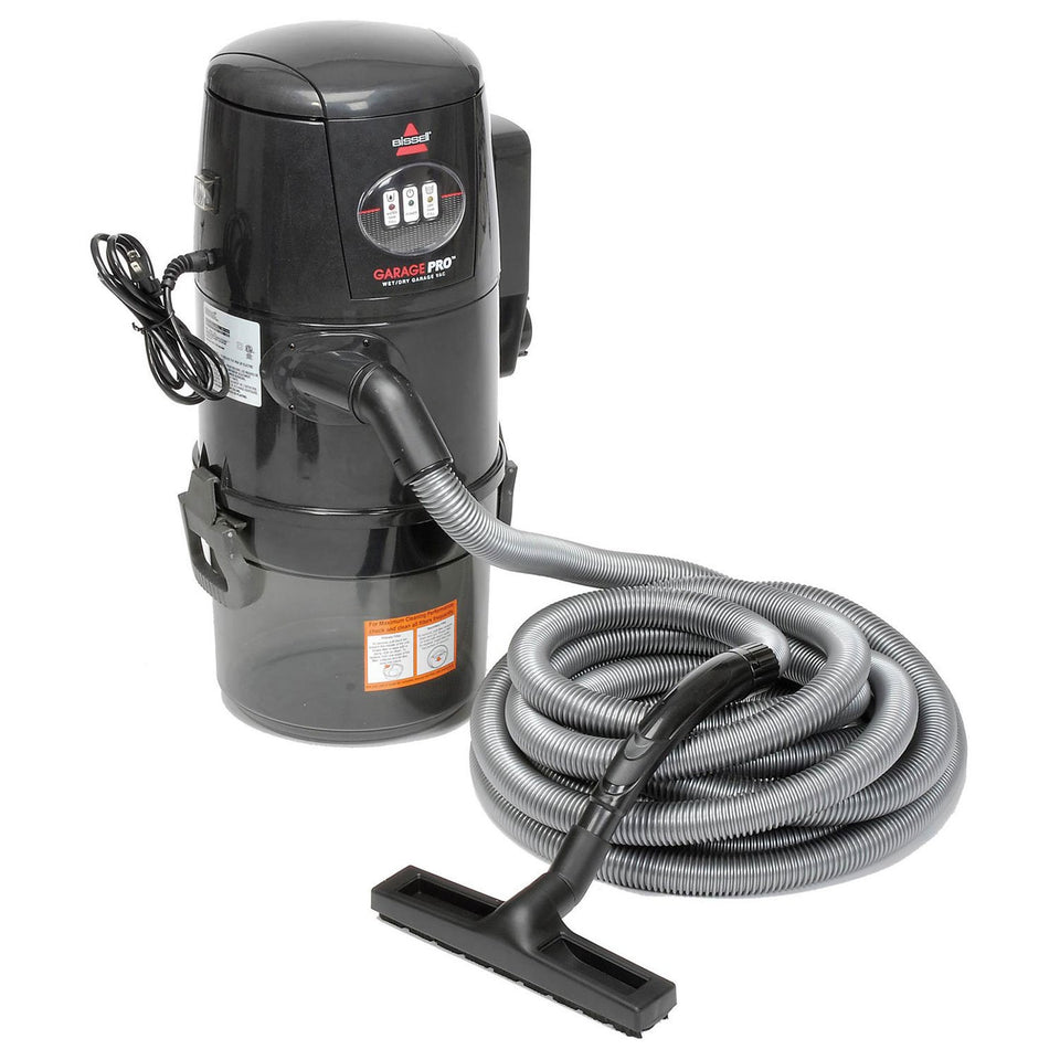 Bissell Garage Pro wall-mounted vacuum with 32-foot hose for garage and car cleaning.