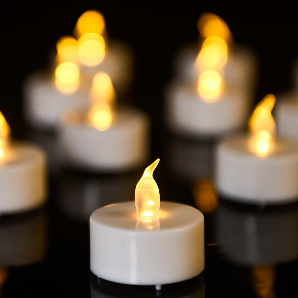 Biyanuo tea light with amber flame for warm ambiance at events.