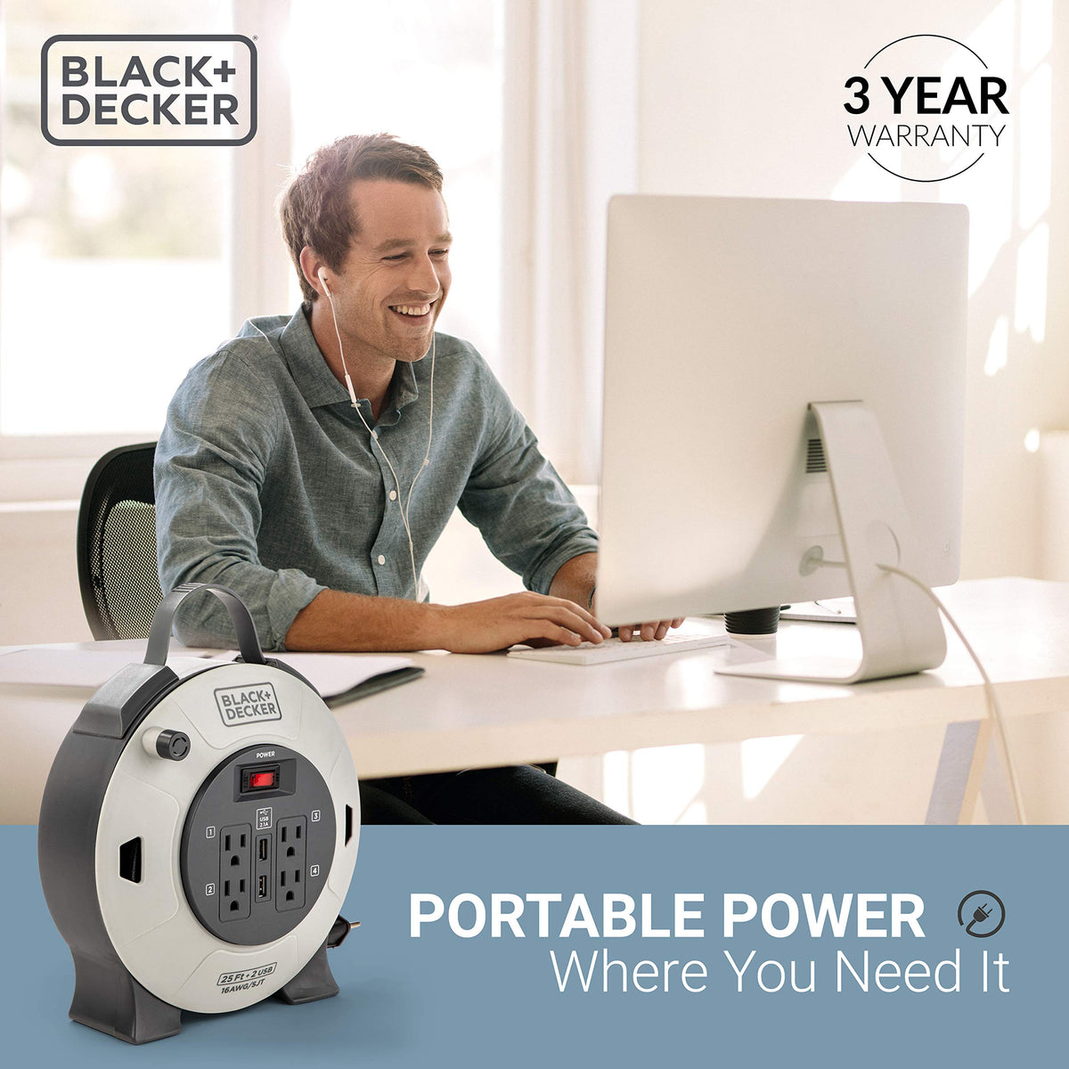 In-use view of Black+Decker 25ft retractable extension cord reel in a small space.