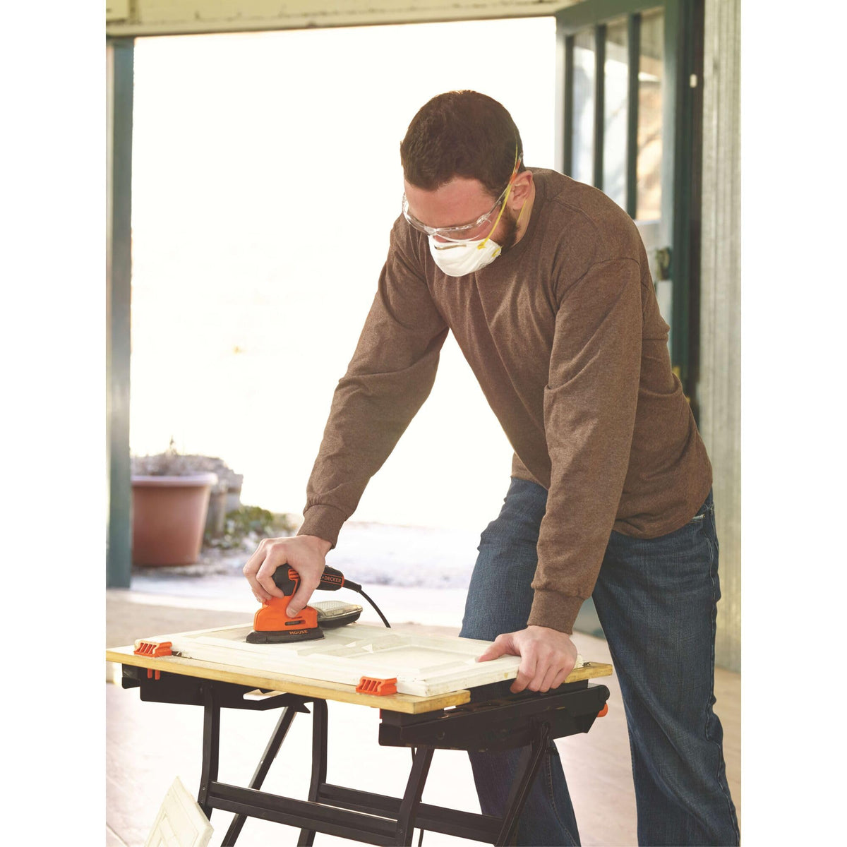 Black+Decker dust collection canister keeps workspace clean