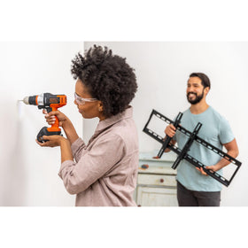 Black+Decker in-use drill/driver completing a home improvement task.