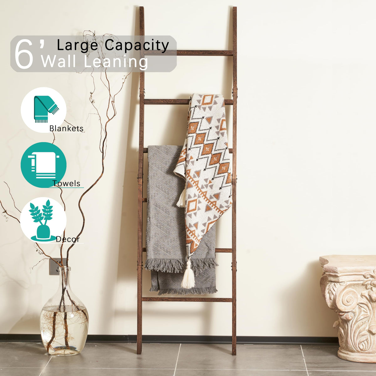 Blossome blanket ladder in living room displays quilts and towels neatly