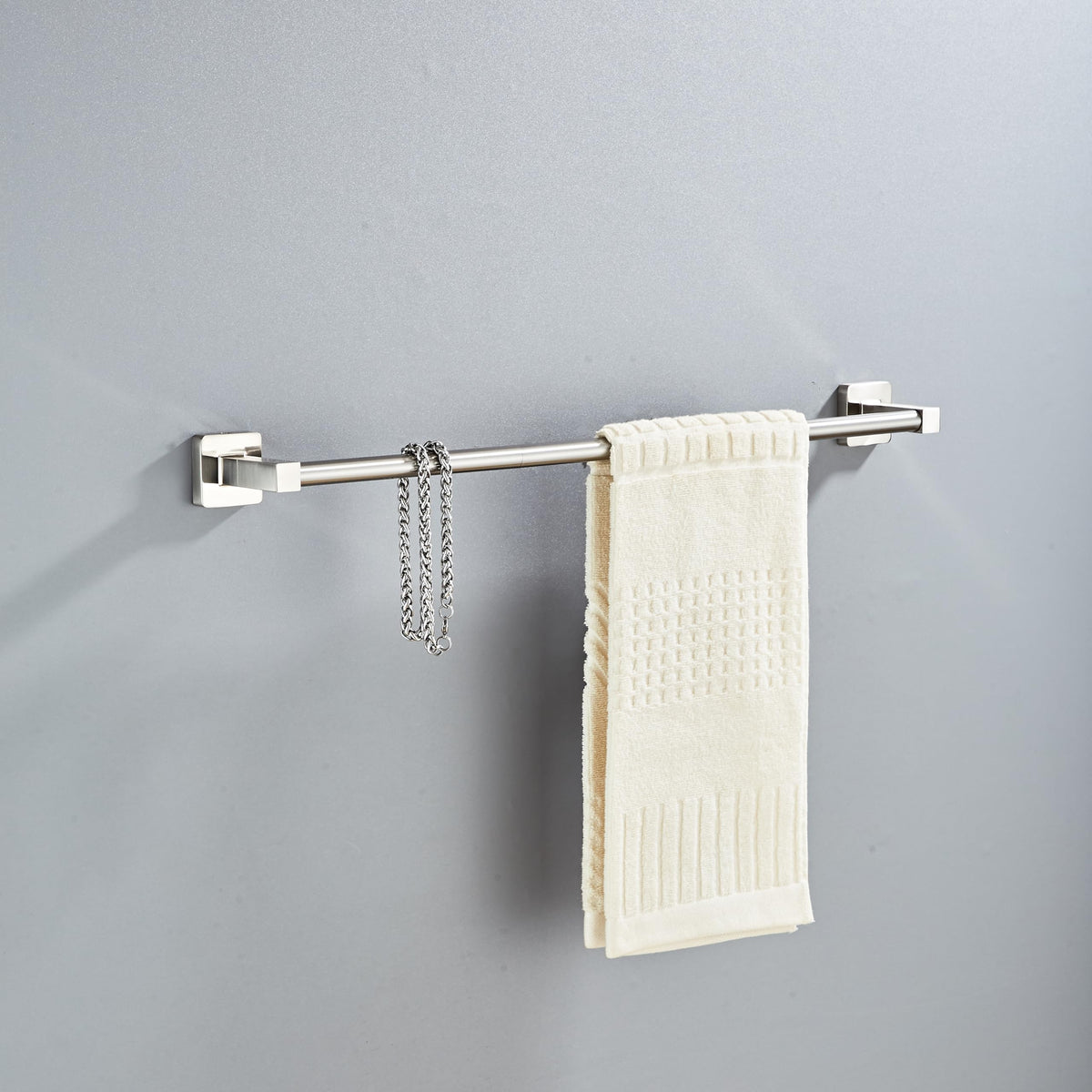Bluebyrne towel ring in brushed nickel adds easy hand-towel storage