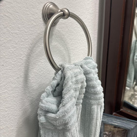 BlueByrne towel ring with brushed nickel finish adds modern style and lasting shine