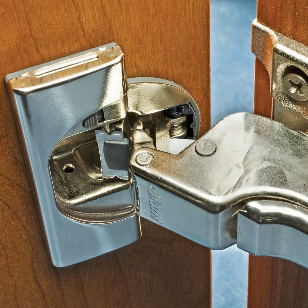 Blum clip-top frameless hinge installed on cabinet door showing flush alignment