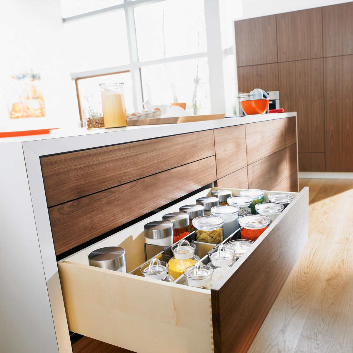 Concealed undermount design from Blum Tandem Plus keeps interiors clean.