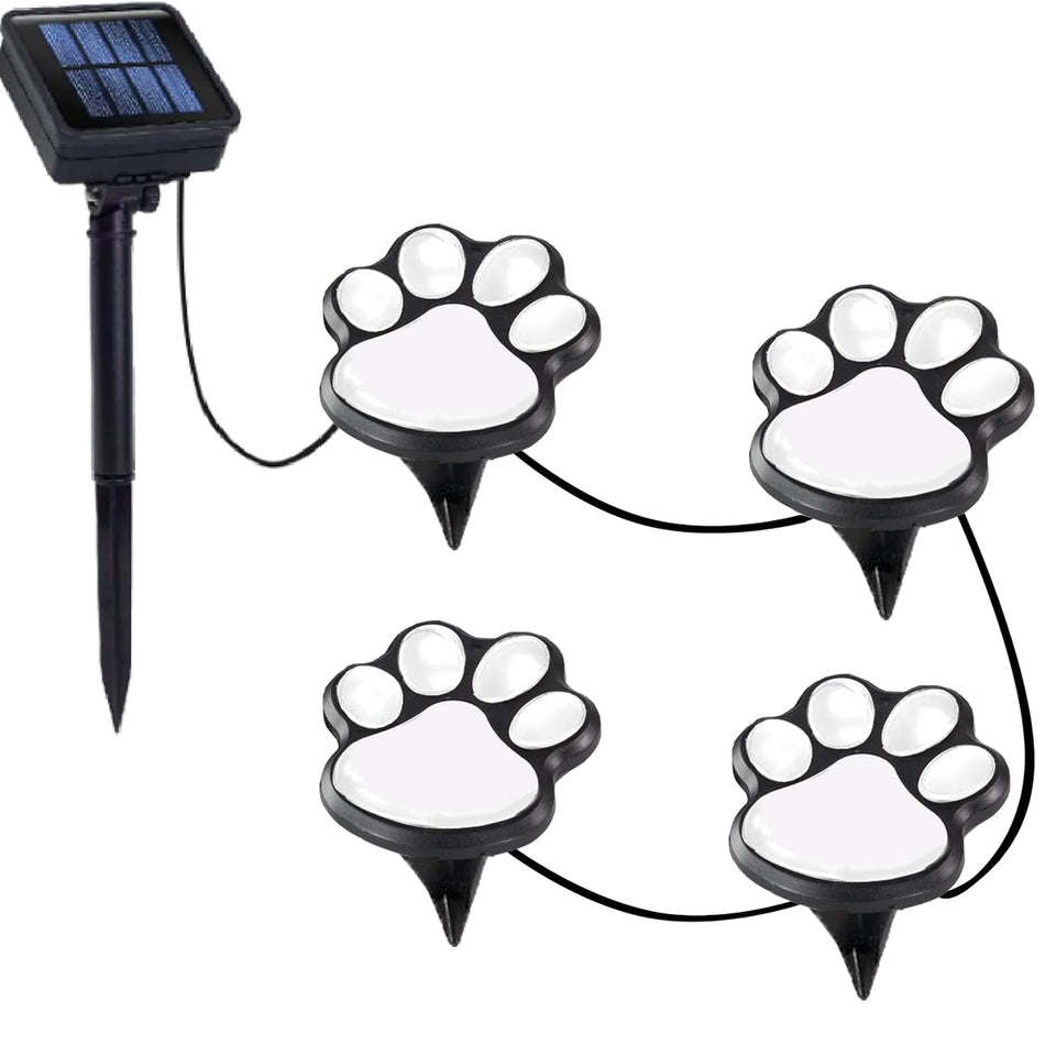 Blunem paw print solar light provides a gentle glow for pathways.