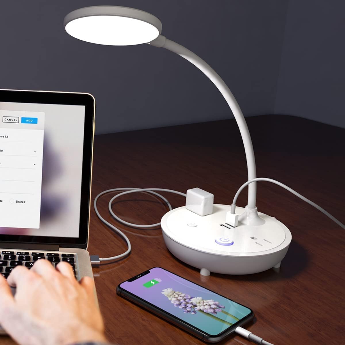 Bodun LED desk lamp with charging station keeps devices powered while you work.