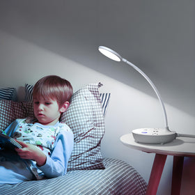 Bodun desk lamp includes two USB ports and two outlets for convenient charging.